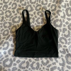Lightly worn forest green lululemon cropped tank top